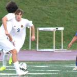 Luke Caputo/Kitsap News Group photos
Spartan junior Cruz Piland and Knight junior Luis Funez Ramos in pursuit of the ball in a 10-1 Bainbridge victory over the Knights March 28 at Bremerton High School.