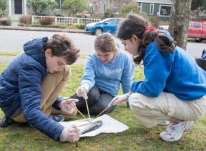 GPC courtesy photos
Timoteo Butler, left, Indie Becker, and Sofia Butler of Catalyst Public Schools explore the anatomy of a salmon.