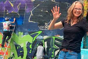 Weichman courtesy photos
Olympic College art professor Marie Weichman at the art wall.