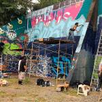 Graffiti enthusiasts come from as far away as California to contribute to the free art wall.