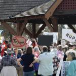 Tyler Shuey/Kitsap News Group photos
Over 2,000 community members showed up in downtown Poulsbo April 5 to protest against the Trump administration.