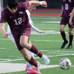 Luke Caputo/Kitsap News Group photos
Xander Zusy of South Kitsap fights for the ball in a 9-1 loss to the Sumner Spartans April 7 in Port Orchard.