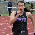 Viking Julie Castillejo competes in a relay event April 19 at the Lil Norway Invitational track meet at North Kitsap High School.