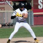 Santiago Herrera of South Kitsap eyes an incoming pitch against Curtis April 22.