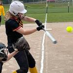 Luke Caputo/Kitsap News Group photos
Buccaneer Brooke Steele connects on a pitch in a 10-2 Kingston loss to the North Kitsap Vikings April 28 in Poulsbo.