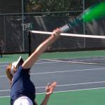 Spartan Elle Schuchman hits a serve in a 6-1, 6-1 singles match loss April 30 at Bainbridge High School.