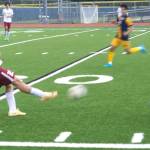 Buccaneer Ketenci strikes the ball down the field in a 12-0 Kingston loss to the Spartans May 2 at Bainbridge High School.
