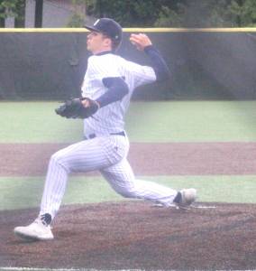 Luke Caputo/Kitsap News Group photos
Spartan Trey Thompson prepares to throw a pitch in a 3-1 Bainbridge district semifinal win over May 17 at Central Kitsap High School.