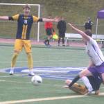 Luke Caputo/Kitsap News Group photos
Spartan Finley Reynolds makes a gesture over a slide tackle in a Bainbridge district championship win over NK May 17.