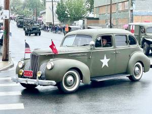 Britney Fletcher-West/Kitsap News Group
Military vehicles roll through downtown Bremerton at the Armed Forces Day Parade May 17.