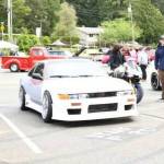 The car show serves as both a fundraiser and a community-building event.