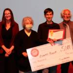 Pat & John Read present Logan Bouck with his scholarship alongside Amy Miller of the South Kitsap Public Education Foundation.
