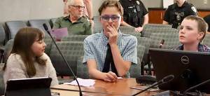 NKSD courtesy photo
Pearson students (left to right) Hunter Boag, Kal Gist, and Ryker Jones present updates on the Poulsbo Pollinator Project to the Poulsbo City Council May 21.