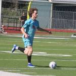 Port Orchard FC midfielder Connor Louden dribbles the ball down the field in a 4-1 win against Sharktopus FC June 7 in Port Orchard.