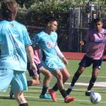 Luke Caputo/Kitsap News Group photos
Port Orchard FC midfielder Jaggar Judkins keeps the ball away from an incoming defender in a 4-1 win against Sharktopus FC June 7 at Kitsap Bank Stadium in Port Orchard.