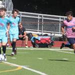 Port Orchard FC midfielder Kolby Juarez looks to make a play with midfielder Jake MacKenzie following behind and a Sharktopus defender approaching June 7 at Kitsap Bank Stadium in Port Orchard.