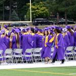 Graduates walk to their seats in preparation for the start of the ceremony June 13.