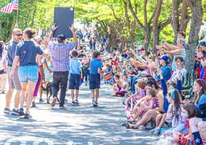 File photos
Huge crowds typically gather on both sides of Highway 104 for the Kingston 4th of July parade.