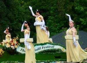 Britney Fletcher-West/Kitsap News Group photos
The Daffodil Royal Court rolls through the Fathoms O Fun Parade in Port Orchard June 28.