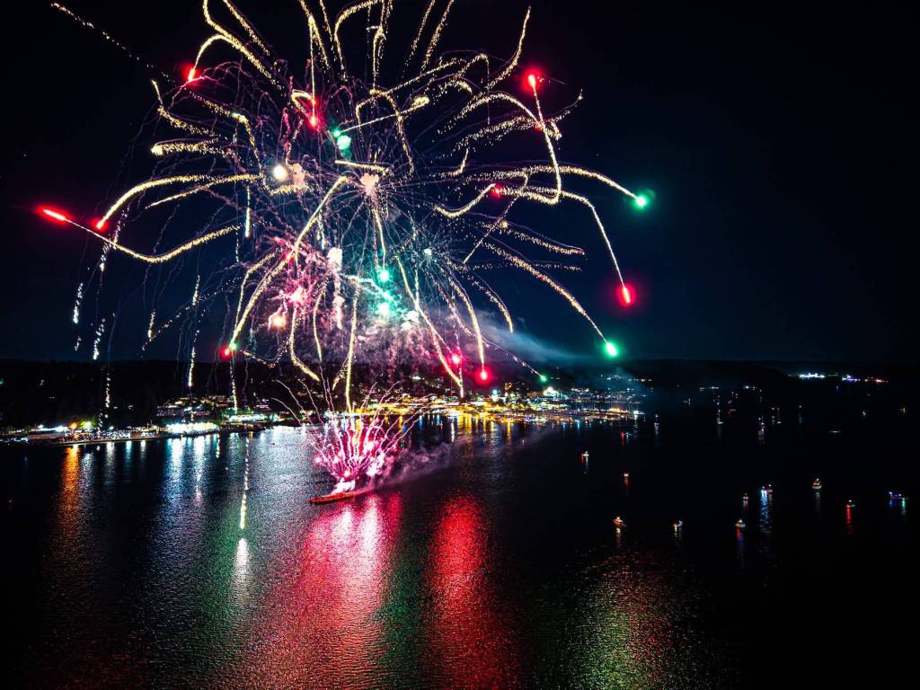 Fireworks paint the sky over Sinclair Inlet.