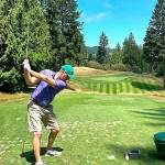 Brandon Rain of Bainbridge Island tees off on a par 3 at Gold Mountains Cascade course, owned by the city of Bremerton that is now undergoing a $4-plus million facelift.
