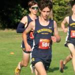 Bainbridge Spartans Mylo Burrows, Miles Fuss, and Hawkeye Grumm compete in the boys cross-country 2-mile varsity event Sept. 3 at the Kitsap County Fairgrounds.