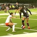 SK sophomore Chloe Legan keeps the ball away from CK senior Olivia Juarez.