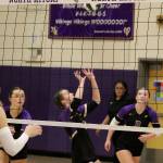 Vikings Emily MacKinnon and Emma Banzer look to set up a spike against South Kitsap Sept. 10 in Poulsbo.