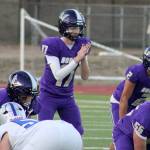 Viking quarterback Teague Weible gets ready to snap the ball with running back Towsyn Walsh next to him in a 27-14 NK loss to the Olympic Trojans Sept. 18 in Poulsbo.