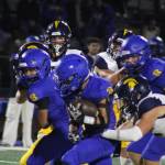 Knight Kenneth Najera barrels through some Bainbridge defenders in a 41-14 Bremerton home win over the Spartans Sept. 19.