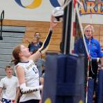 Spartan Cate Torrell goes up for a spike in a 3-0 Bainbridge home win over the Kingston Buccaneers Sept. 25.