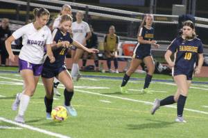 Luke Caputo/Kitsap News Group photos
Spartan Eliza Jurcak and Viking Brooke Keyser fight for the ball during a 1-0 Bainbridge home win over North Kitsap Oct. 2.
