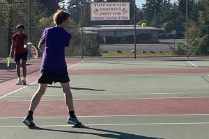 Luke Caputo/Kitsap News Group photos
Viking Grady DeVries hits a backhand in his doubles match win against Kingston Oct. 7 at North Kitsap High School.