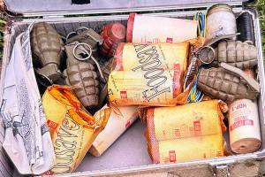 KCSO courtesy photo
A small case filled with hand grenades and other types of explosive devices was found in an Olalla residence Dec. 1.