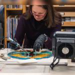 A student works in BARNs Glass Arts Studio during Copper Foil Stained Glass, taught by Diane Bonciolini of Mesolini Glass. Courtesy BARN