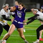 Giana Pallo and Tori Schmidt of SK attempt to pull the flags of a Sumner player during a game Dec. 18.