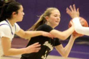 Luke Caputo/Kitsap News Group
Viking Abby Marrero defends Spartan Josie Knapp in a 73-50 Bainbridge road win over North Kitsap Feb. 5 in Poulsbo.