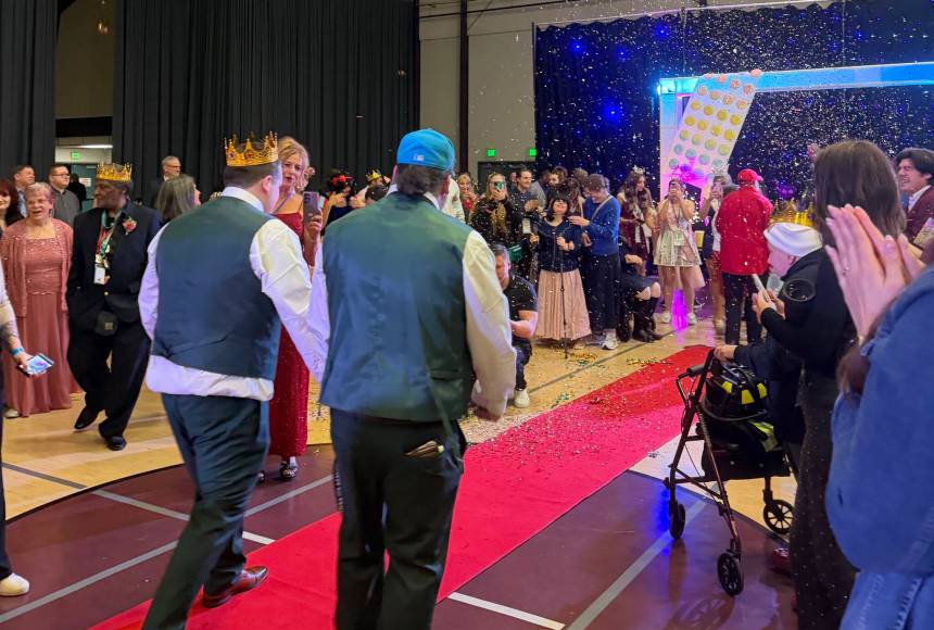 <p>Katherine Bouma/Kitsap News Group</p>
                                <p>About 400 people attended the Night to Shine event at the Kitsap County Fairgrounds Feb. 13.</p>