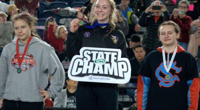Luke Caputo/Kitsap News Group photos
Viking Carly Anderson holds her championship medal at the state wrestling Mat Classic Feb. 21 at the Tacoma Dome.
