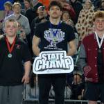 Viking Luan Bekteshi wears his championship medal at the state wrestling Mat Classic Feb. 21 at the Tacoma Dome.