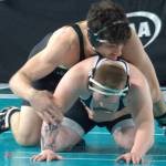 Viking Luan Bekteshi pins Orting Cardinal Amos Voss in the championship match of the boys 2A 175-pound weight class at the state wrestling Mat Classic Feb. 21 at the Tacoma Dome.