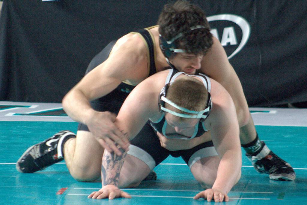 Viking Luan Bekteshi pins Orting Cardinal Amos Voss in the championship match of the boys 2A 175-pound weight class at the state wrestling Mat Classic Feb. 21 at the Tacoma Dome.