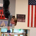 Buccaneer Indigo Pavey competes in the bars event during the 1A/2A/3A state gymnastics championships Feb. 21 at Sammamish High School.