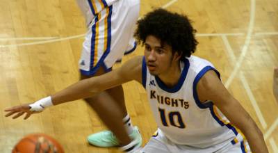 Luke Caputo/Kitsap News Group
Knight Jalen Davis defends a Renton player during a 75-57 Bremerton win in the opening round of the 2A boys state basketball tournament Feb. 28 at the University of Puget Sound in Tacoma.