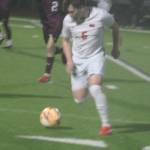 Cougar Eli Daniels dribbles the ball in a 2-0 Central Kitsap win over South Kitsap March 11 in Port Orchard.