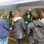 Bainbridge High School students listen to boilermaker Jennifer Patrick at the Eagle Harbor weld shop.