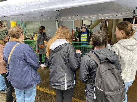 Bainbridge High School students listen to boilermaker Jennifer Patrick at the Eagle Harbor weld shop.