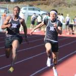 Vikings Isaiah Randall (left) and Ellis Slade (right) sprinting in the boys 100-meters during a track and field meet at North Kitsap High School March 26.