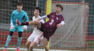 Luke Caputo/Kitsap News Group photos
SK sophomore midfielder Jesse Booth tries to contain the ball in a 3-2 home loss to Battle Ground March 27 in Port Orchard.