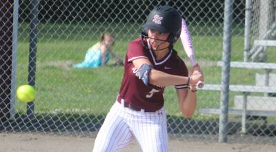 Luke Caputo/Kitsap News Group photos
Liz Desilets of SK swings at an incoming pitch in a 10-1 Wolves home loss to Rogers (Puyallup) April 20.